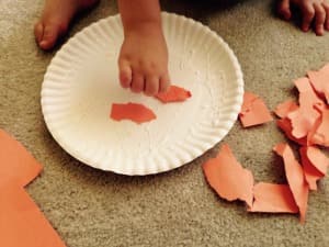 Glueing paper for A Fun Pumpkin Craft for Young Children
