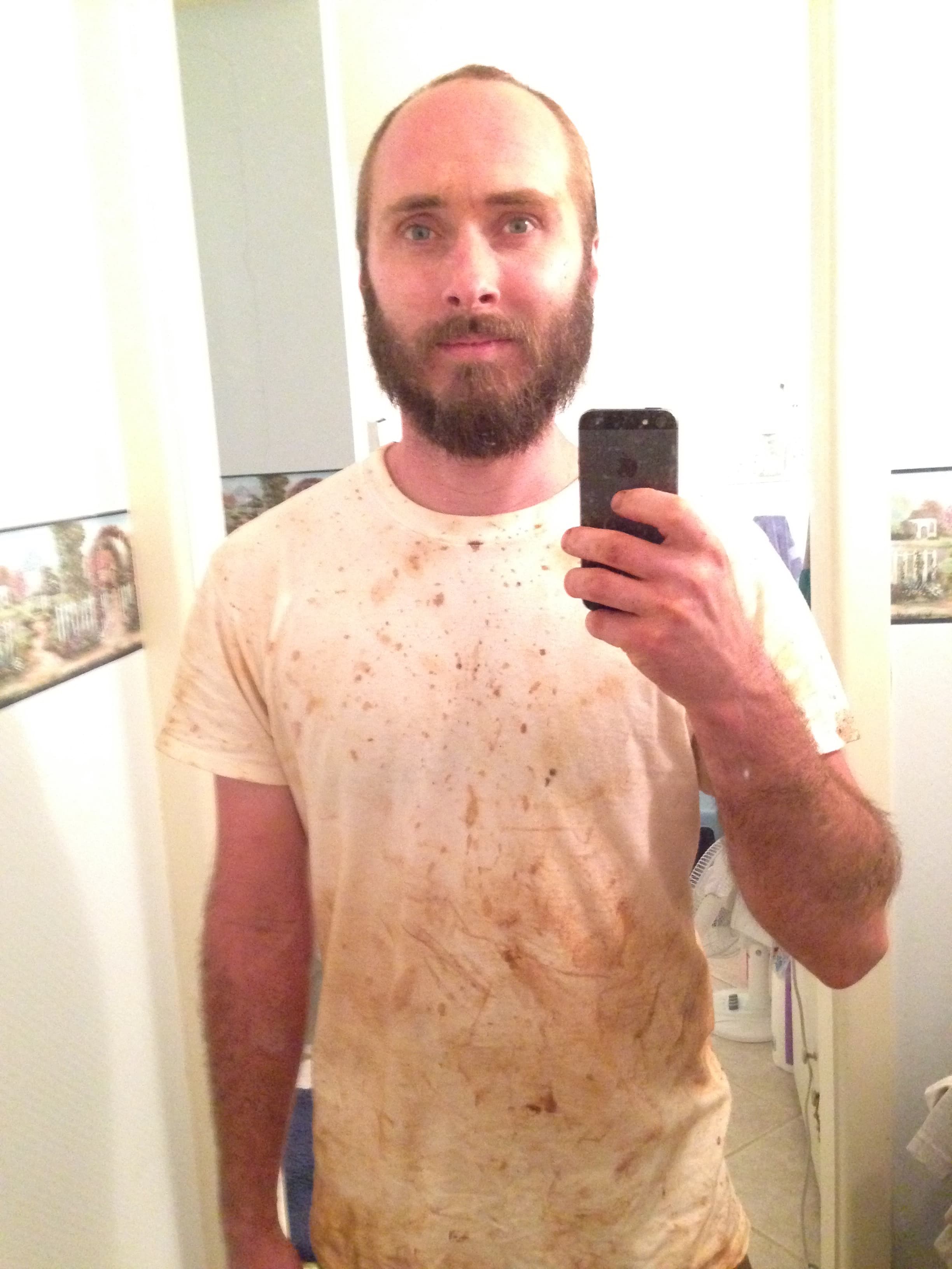 Eric takes a selfie while covered in mud from a long days work.