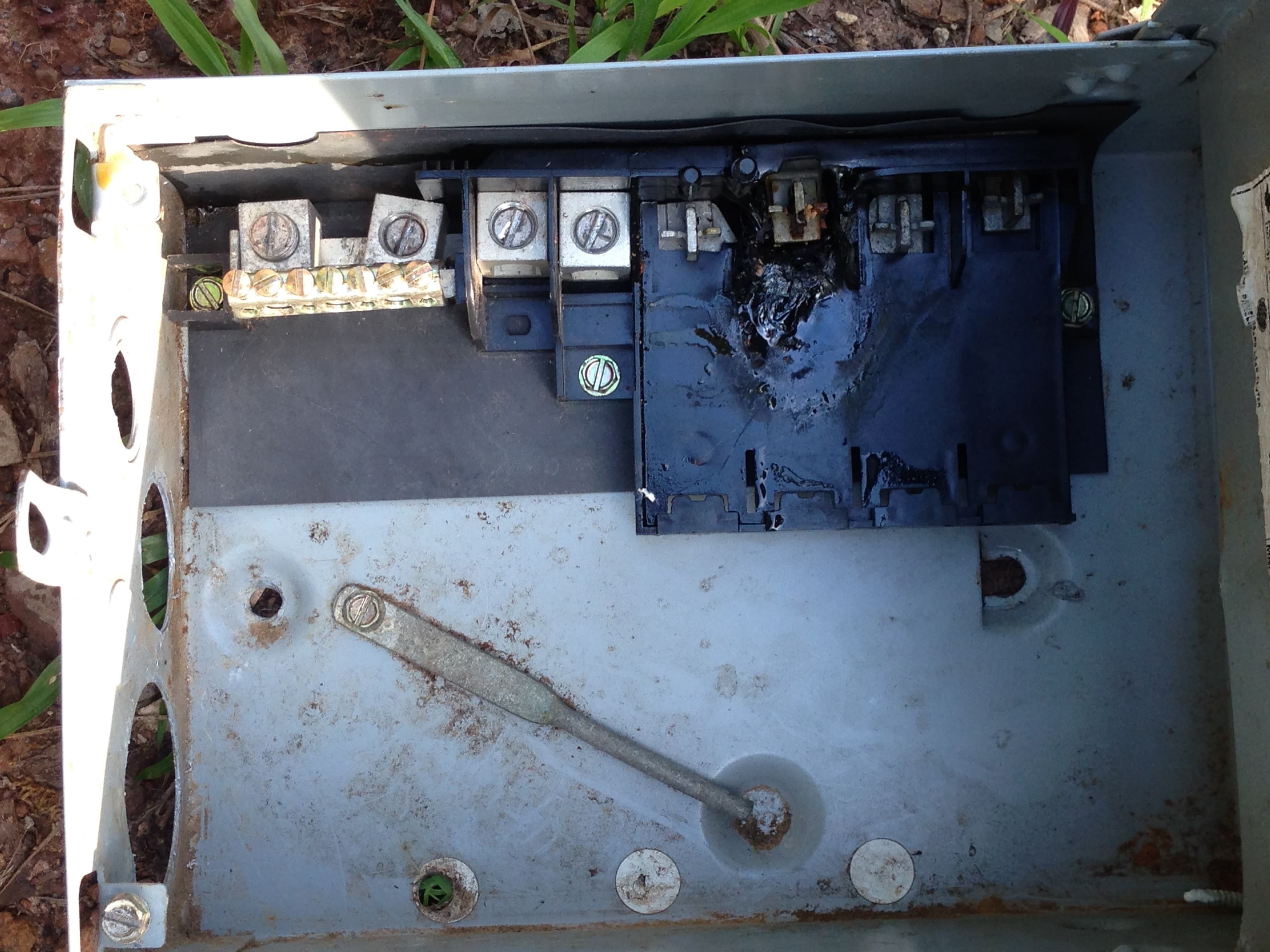 This is the old electrical box that came with the house. It burned up when we attempted to use it.